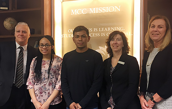 photo of Jill Gallagher with MCC president Gabbard and scholarship recipients