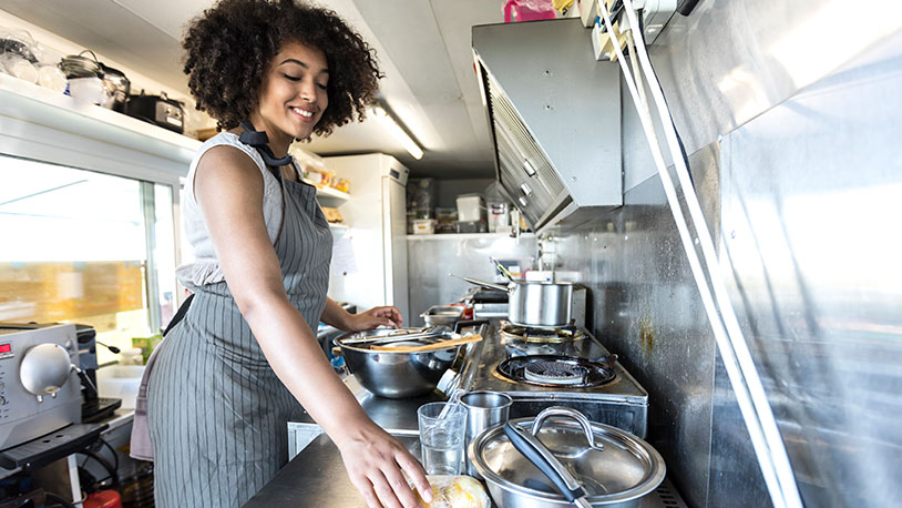 small business owner working in a food truck