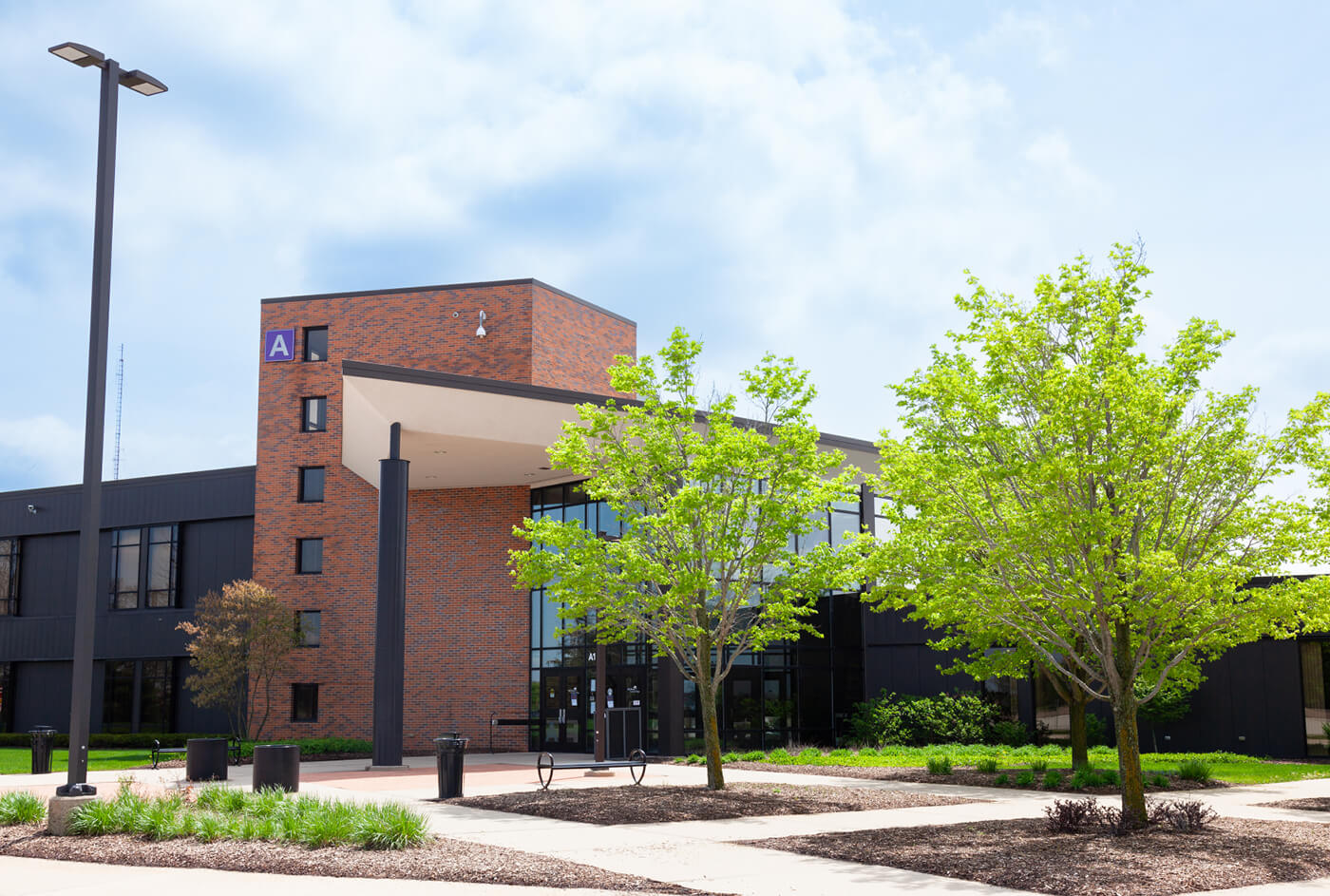 The entrance to Building A on a sunny day