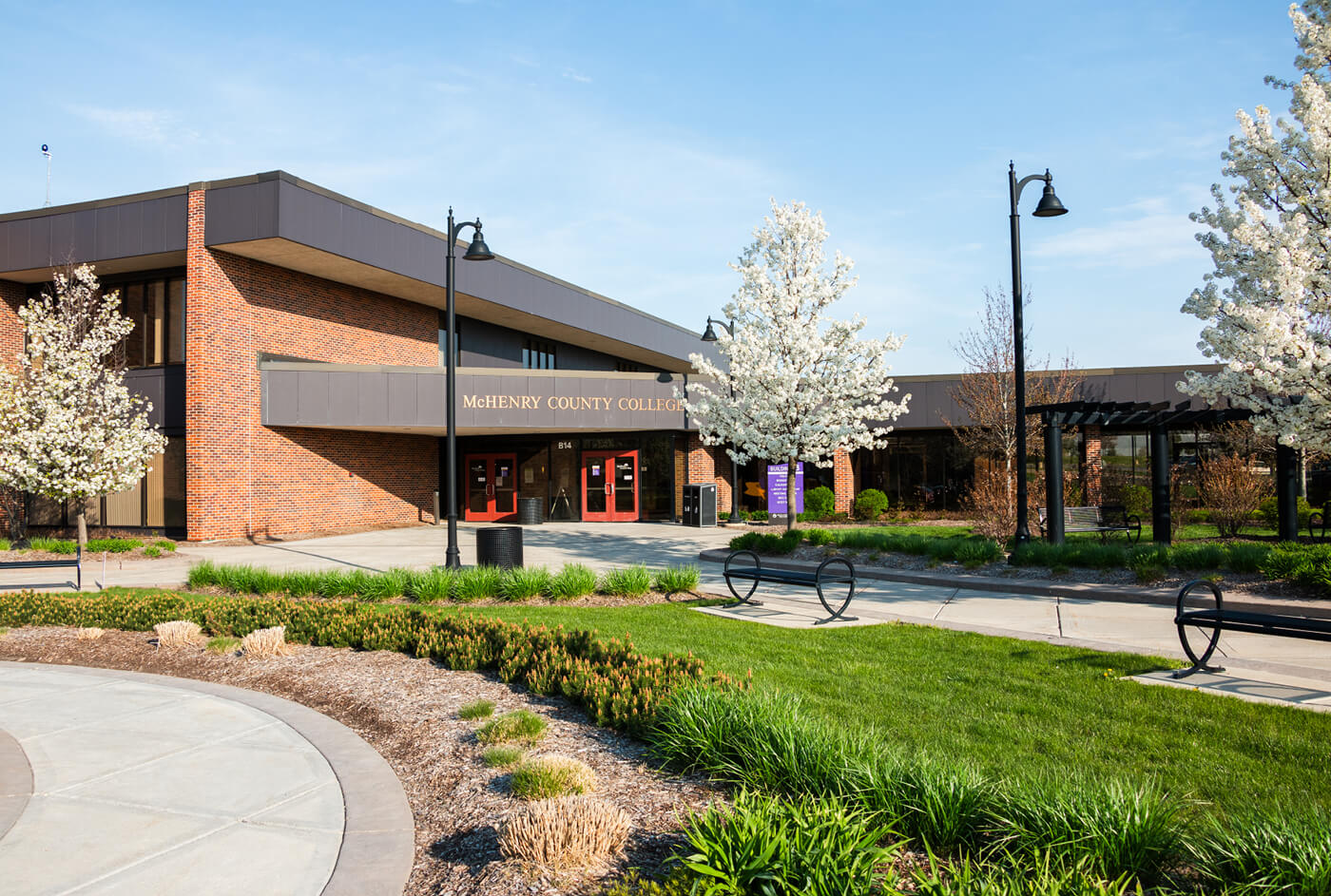 trees blossom near the entrance to Building B