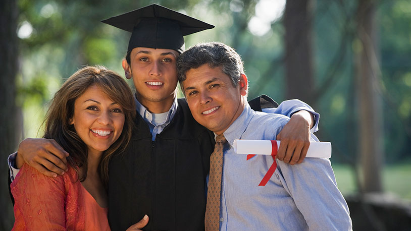 proud parents with graduating student