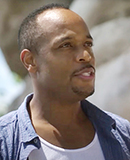 Dr. Christopher Davis onsite looking at rocks