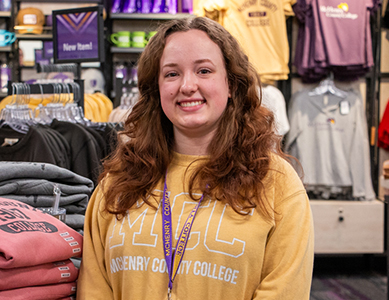 Student worker Jessi Hyde stands in the MCC Store